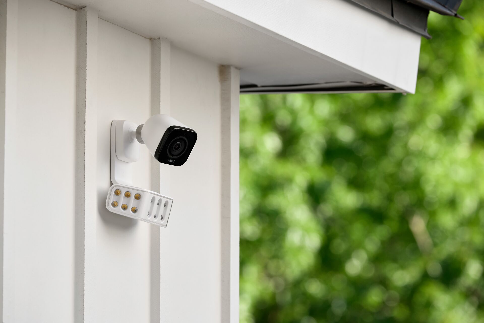 Outdoor weatherproof wall-mounted smart security camera with active infrared illuminators